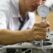 Hand mechanic using Bore gauge (Measurement Tool) Checking cylinder in Engine block .Repair car in workshop